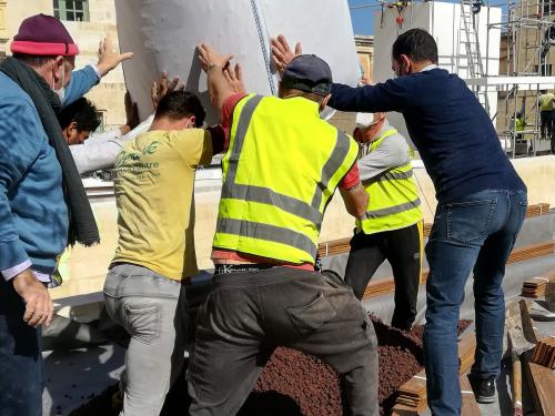 Substrated is being lifted onto a roof