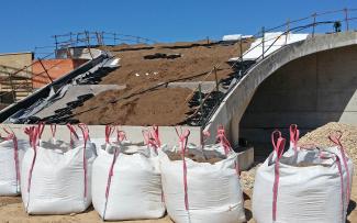 Substrat is being applied on a pitched green roof