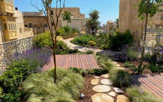 Roof garden with seating area and natural stones